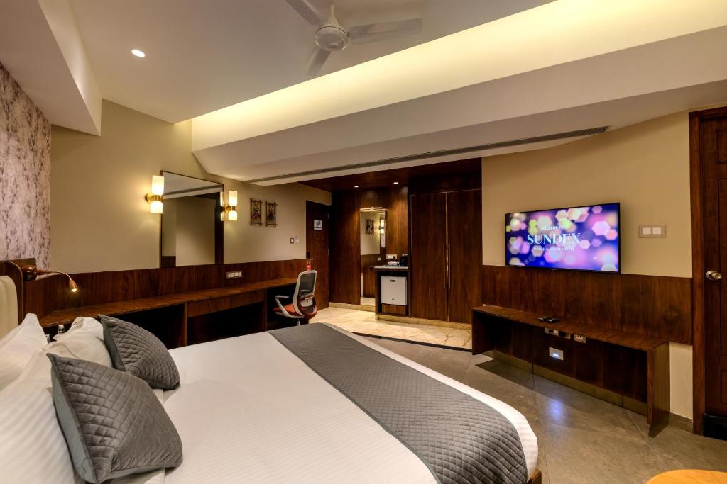 TV a/nebo společenská místnost v ubytování Sundex Hotel