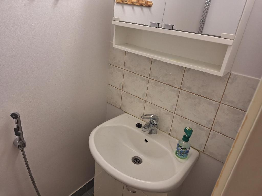 Koupelna v ubytování Hotelli Pogostan Hovi