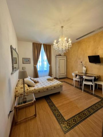 Postel nebo postele na pokoji v ubytování Residenza Mordini