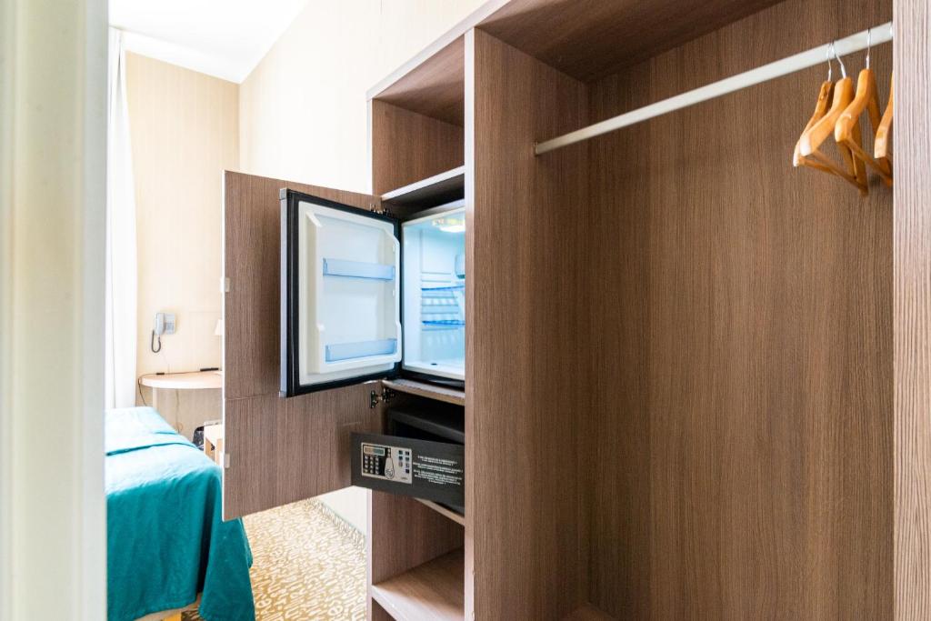 TV a/nebo společenská místnost v ubytování City Hotels Algirdas