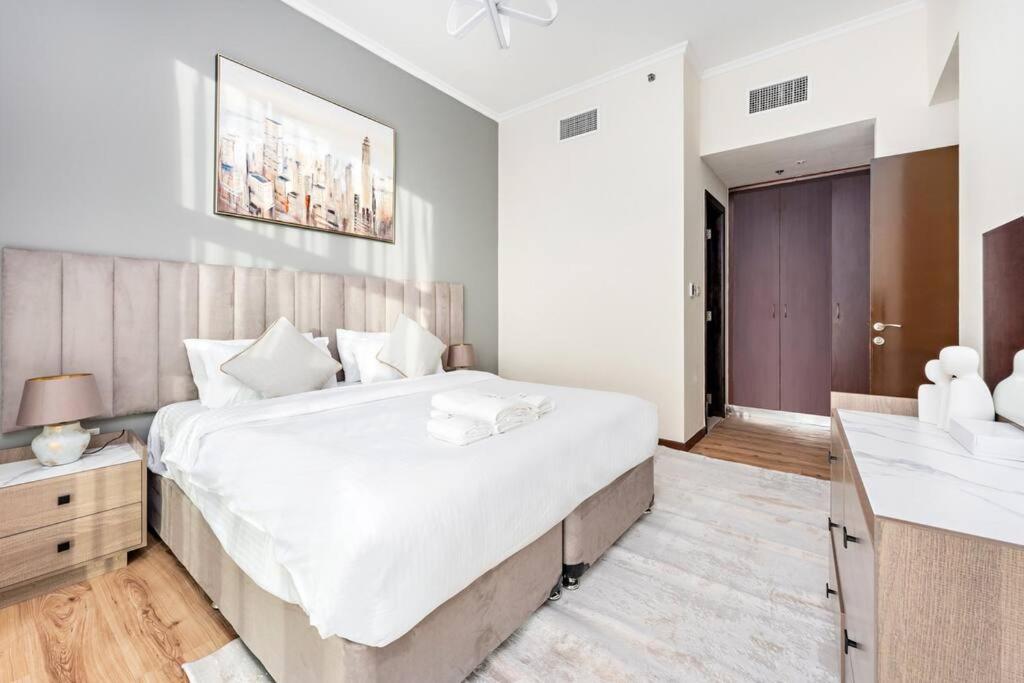 Postel nebo postele na pokoji v ubytování StoneTree - Modern Style 1 BR near Marina Walk