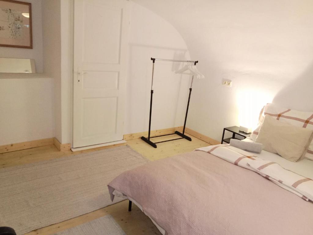 Postel nebo postele na pokoji v ubytování Apartment mit 1 Schlafzimmer in Altstadthaus