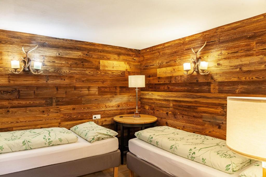 Postel nebo postele na pokoji v ubytování Villa Maria Tirol