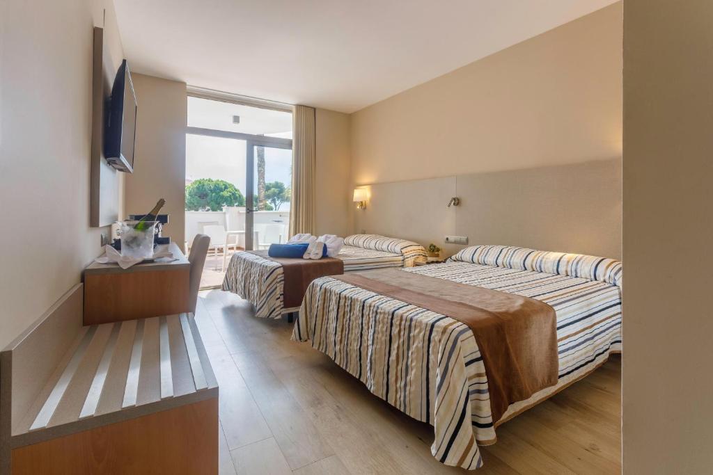 Postel nebo postele na pokoji v ubytování Hotel Best Cambrils