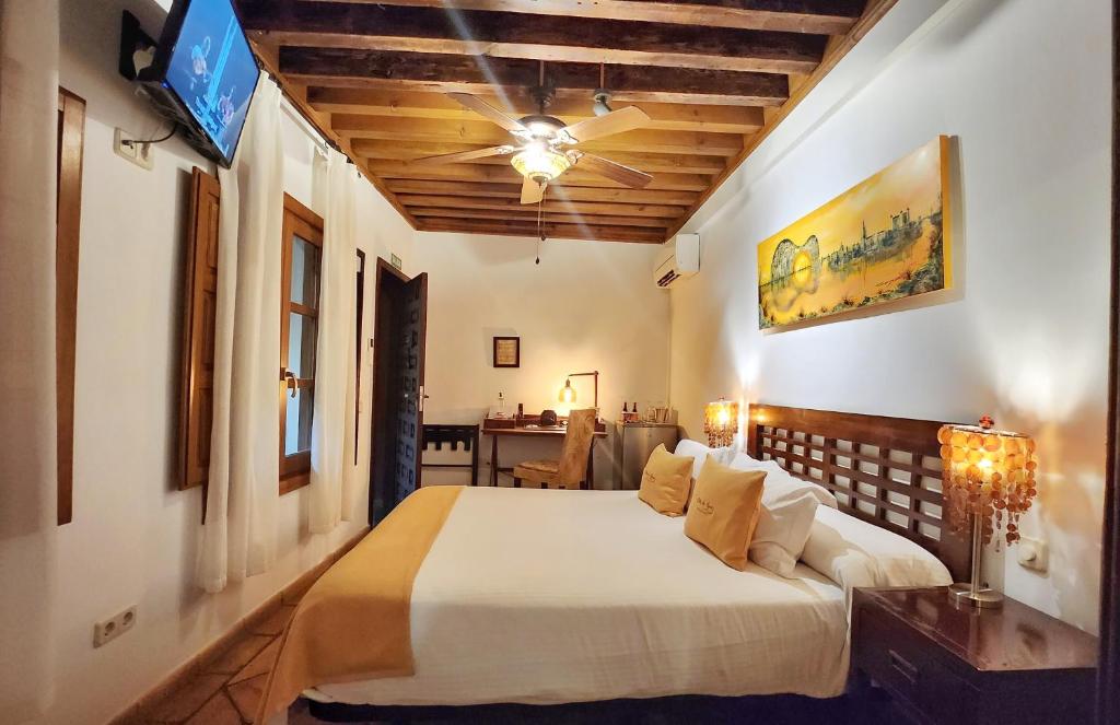 Postel nebo postele na pokoji v ubytování Entre Dos Aguas Hotel Boutique