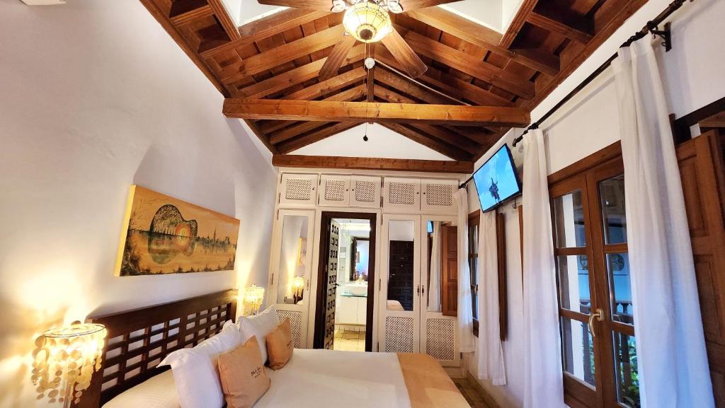 Postel nebo postele na pokoji v ubytování Entre Dos Aguas Hotel Boutique
