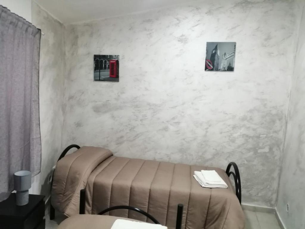 Posteľ alebo postele v izbe v ubytovaní Case Serena vacanze relax