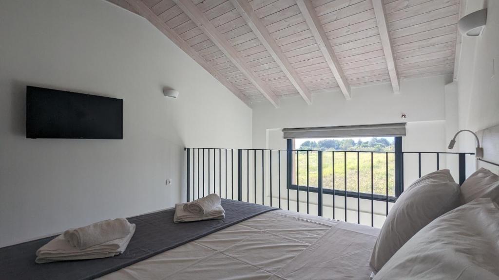 Postel nebo postele na pokoji v ubytování Costa Ionica · Mytikas Seaside Hotel