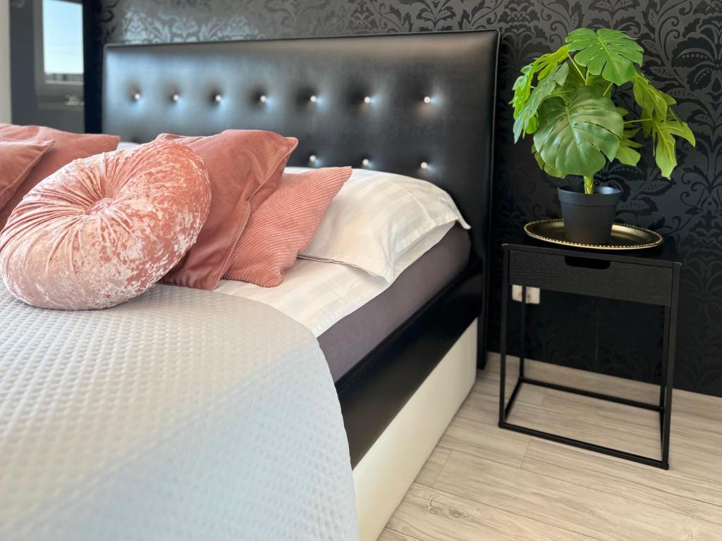 Posteľ alebo postele v izbe v ubytovaní Spółdzielcza 22 Apartament Sky Line