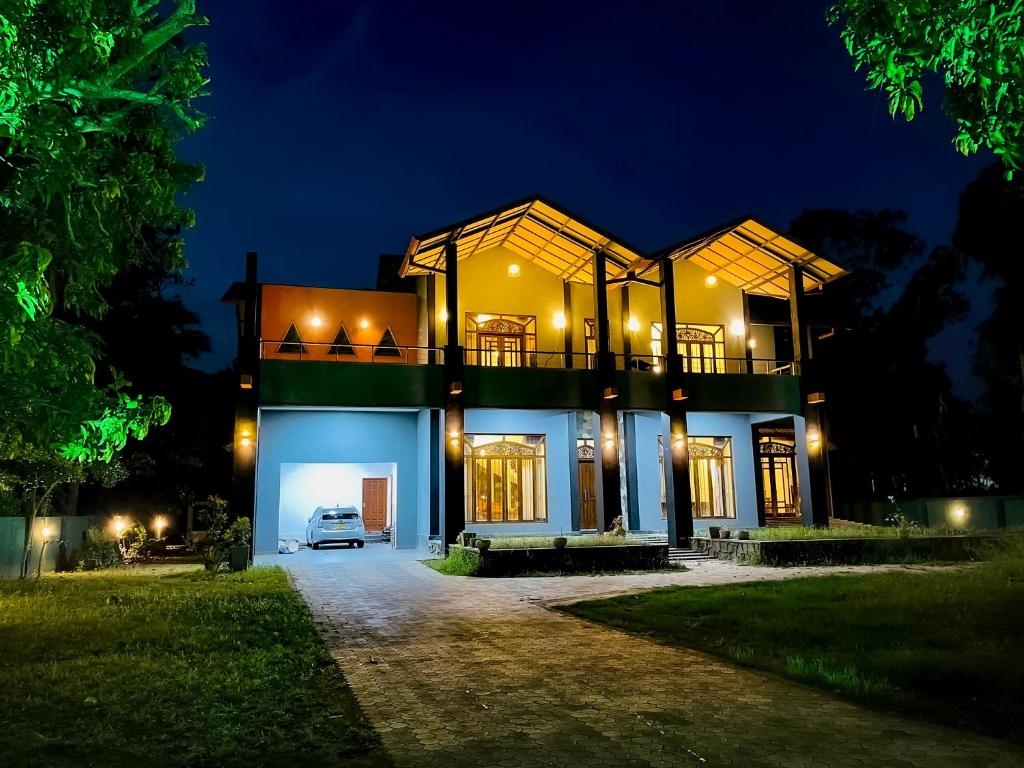 a house at night with its lights on at Fortress Gate Bungalow in Polonnaruwa