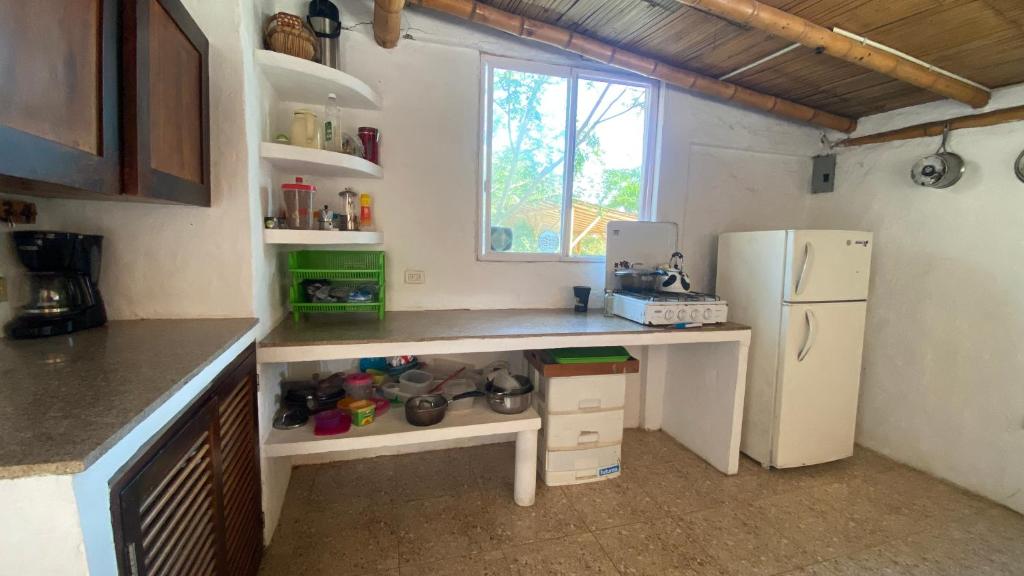 Kuchyň nebo kuchyňský kout v ubytování Hosteria Guachapeli