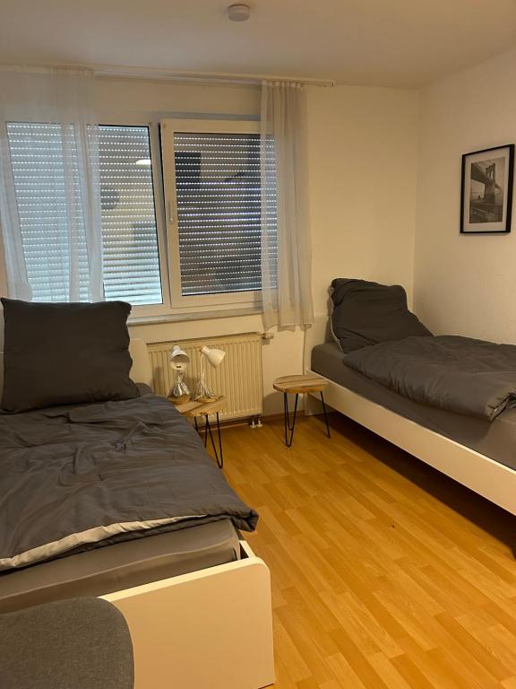 Ένα ή περισσότερα κρεβάτια σε δωμάτιο στο Vallendarer Stübchen