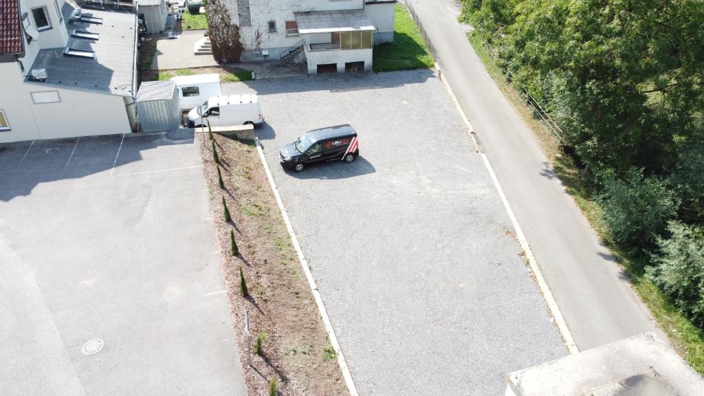 an aerial view of a car parked on a street at Hotel Sorella in Ittlingen