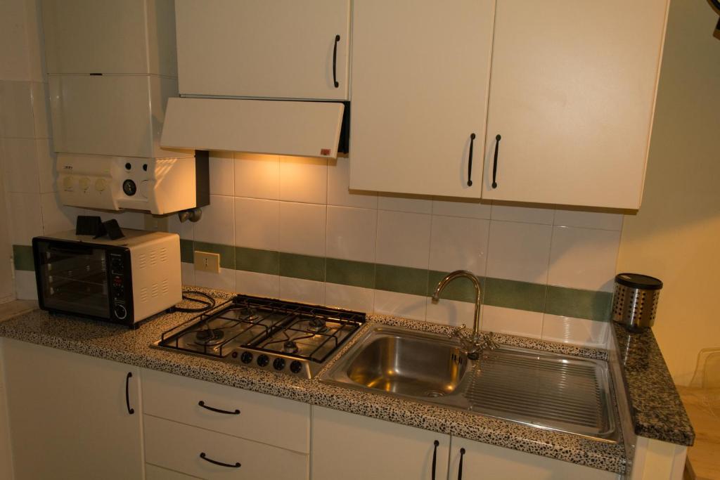 Kuchyň nebo kuchyňský kout v ubytování B&B Apartments Casa Sullavalle