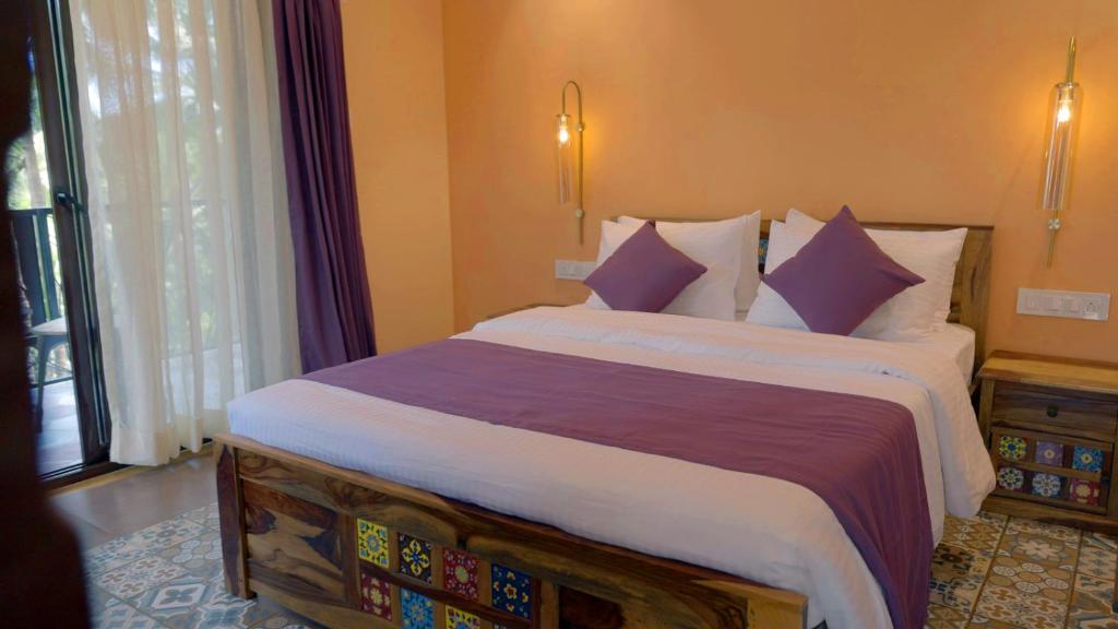 Postel nebo postele na pokoji v ubytování Atmani waterfront resort