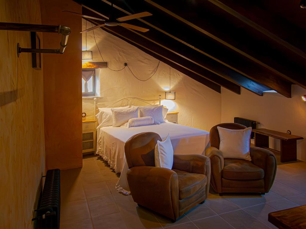Postel nebo postele na pokoji v ubytování Hotel Posada Al Vent - Adults Only
