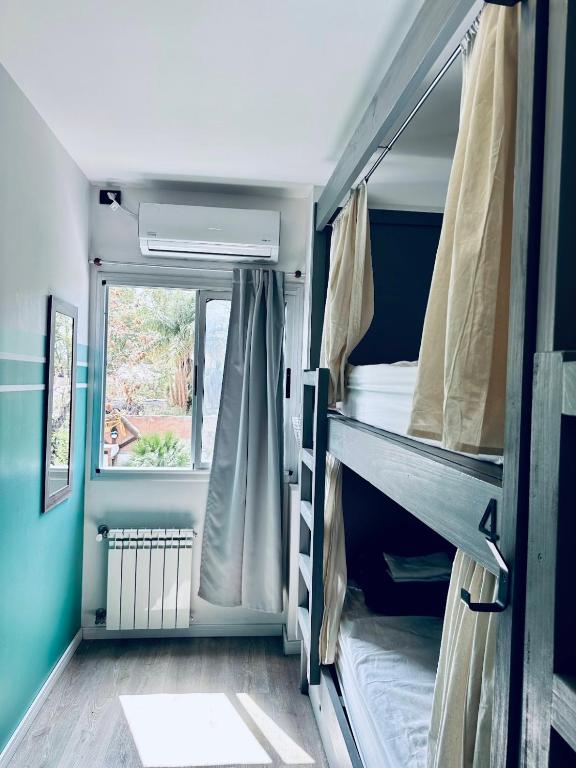 Postel nebo postele na pokoji v ubytování Gorilla Hostel
