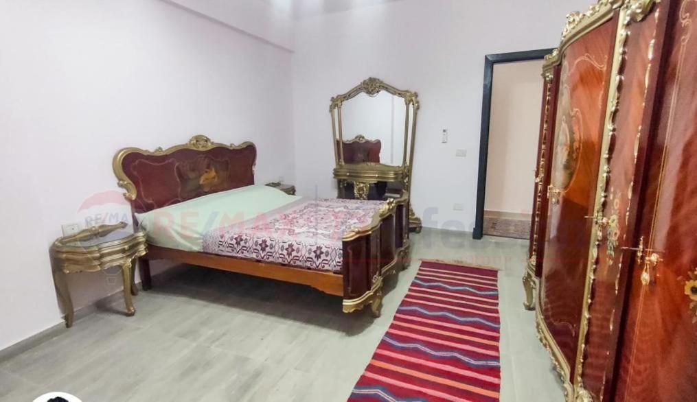 Postel nebo postele na pokoji v ubytování North Coast sedra resort Villa, قرية سيدرا الساحل الشمالي