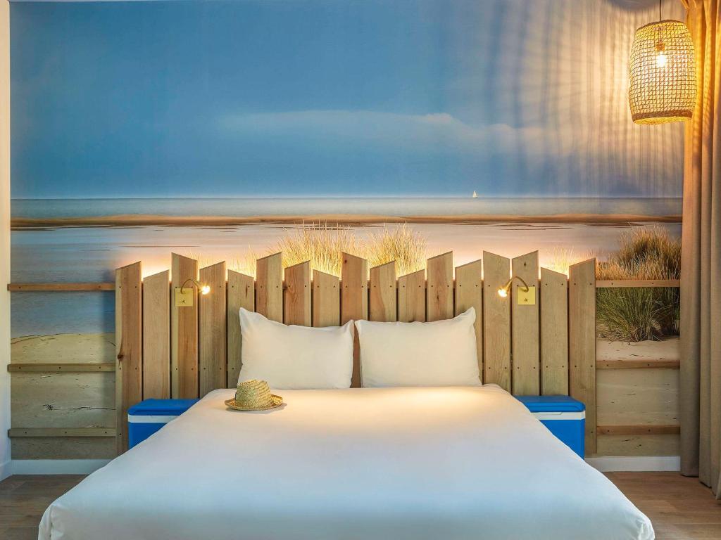 Postel nebo postele na pokoji v ubytování Ibis Styles Montpellier Aéroport Parc Des Expos