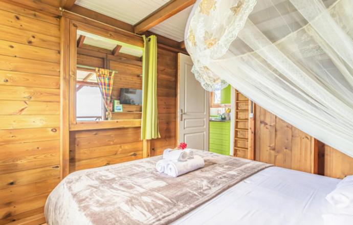 Postel nebo postele na pokoji v ubytování L'îlot Fruits Guadeloupe