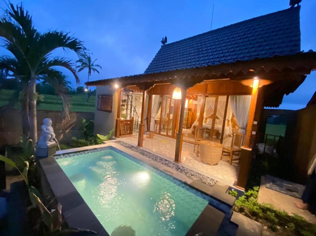 Bazén v ubytování Barong Bali Resort Ubud nebo v jeho okolí