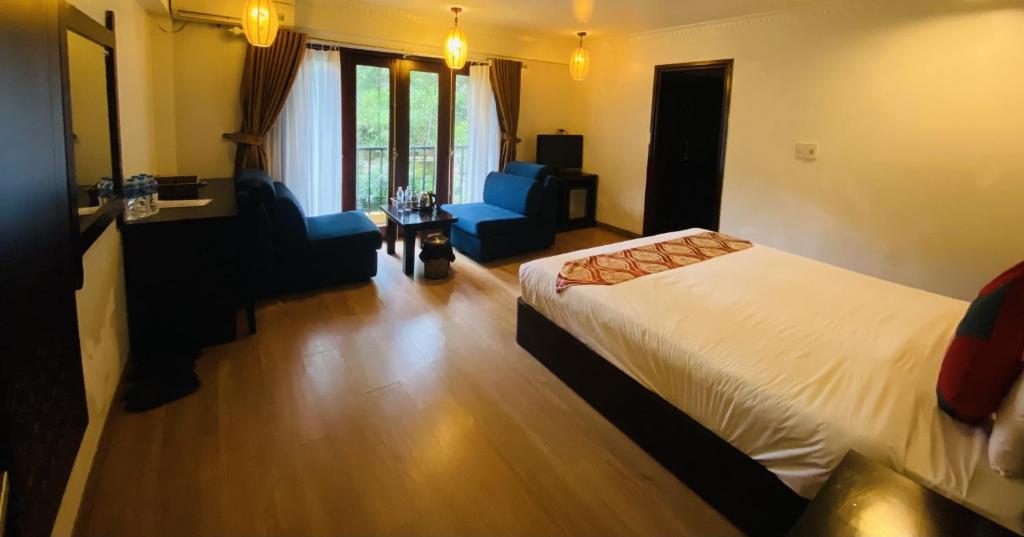Postel nebo postele na pokoji v ubytování Sapa Elite Hotel