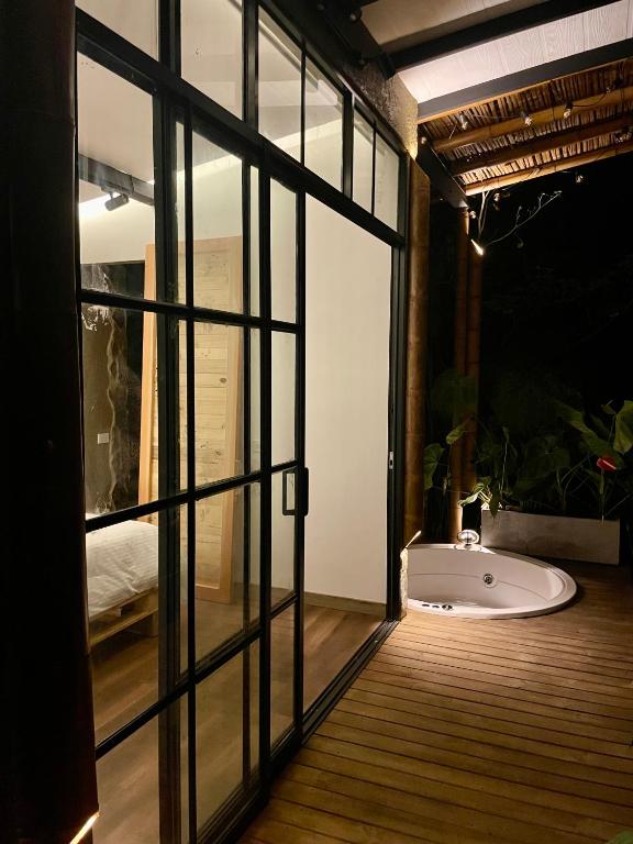 Postel nebo postele na pokoji v ubytování Ecohotel Alma