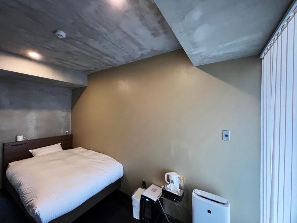 maejima Hotelにあるベッド