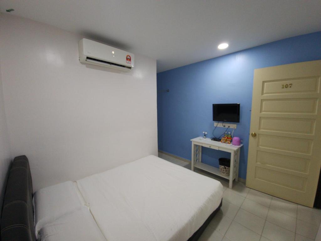 TV a/nebo společenská místnost v ubytování Minshu RoomStay