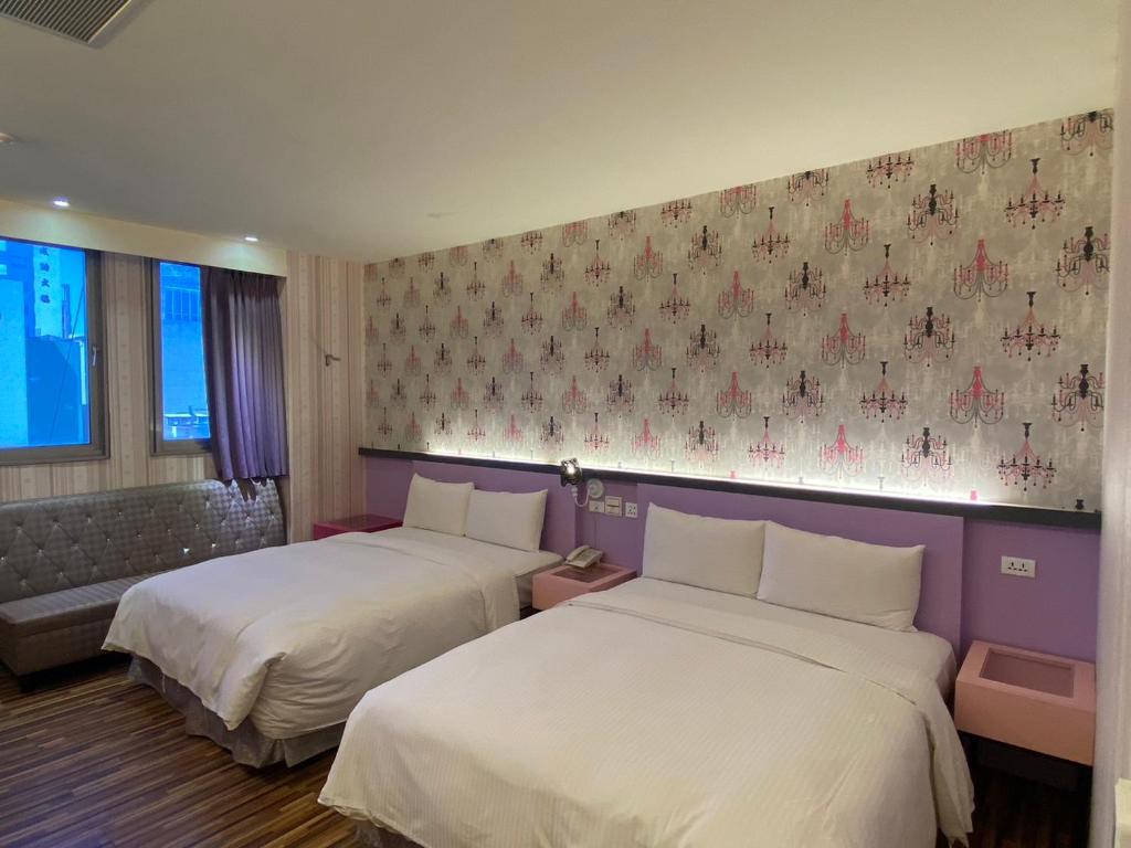 Postel nebo postele na pokoji v ubytování 191 Hotel