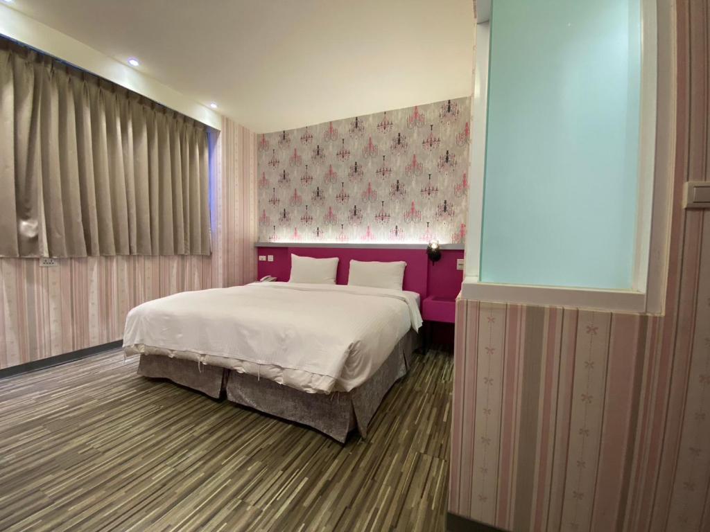 Postel nebo postele na pokoji v ubytování 191 Hotel