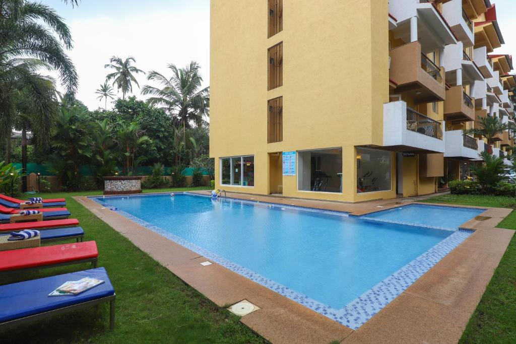 Bazén v ubytování Veeraas Strand Park Apartment by Alaya Stays nebo v jeho okolí