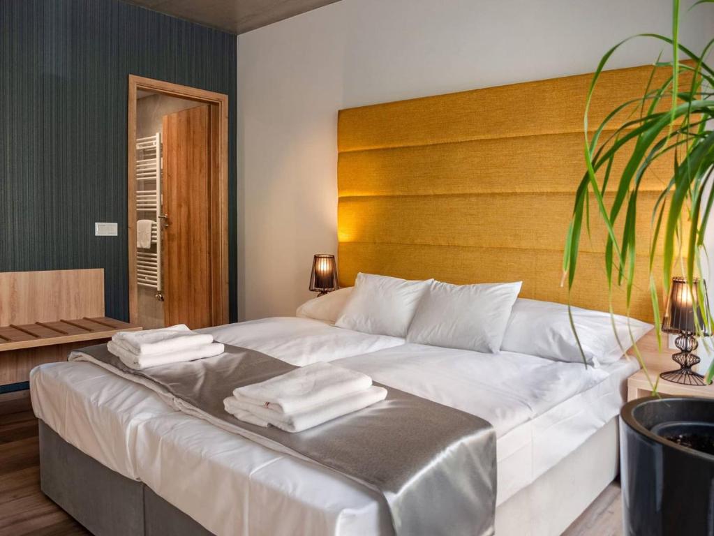 Postel nebo postele na pokoji v ubytování R31 Residence