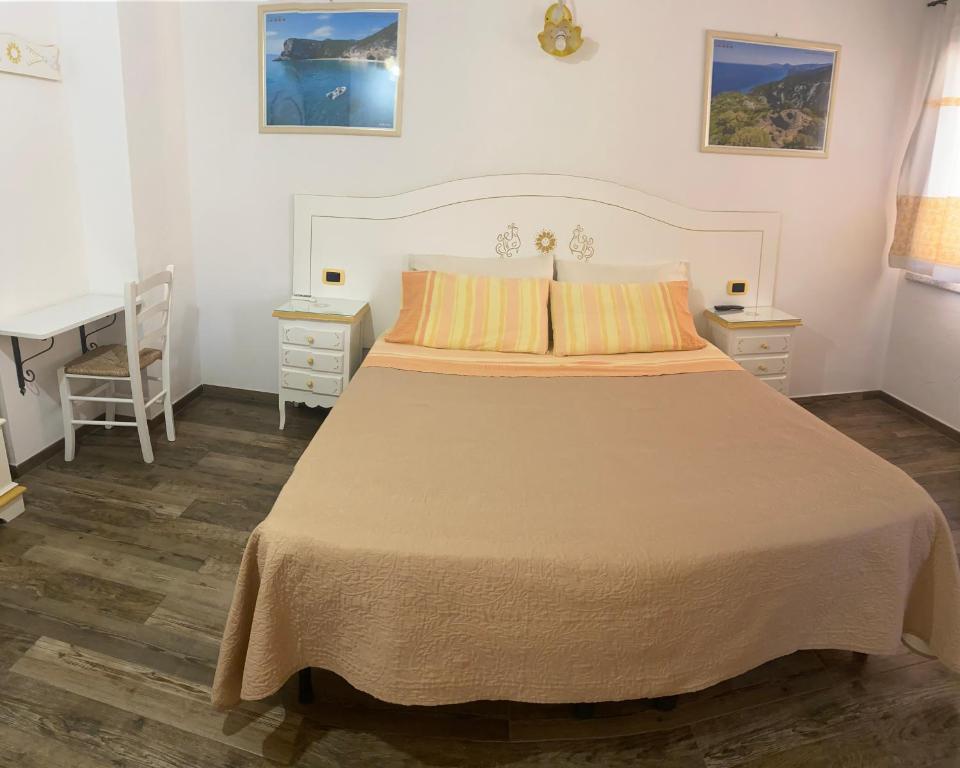 Postel nebo postele na pokoji v ubytování B&B da Miranna