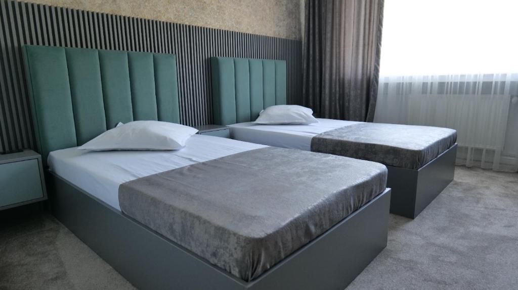 Postel nebo postele na pokoji v ubytování Hotel Parc