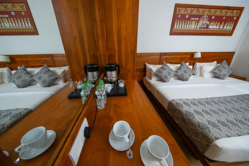 Postel nebo postele na pokoji v ubytování BPR - Asgiriya ,Kandy