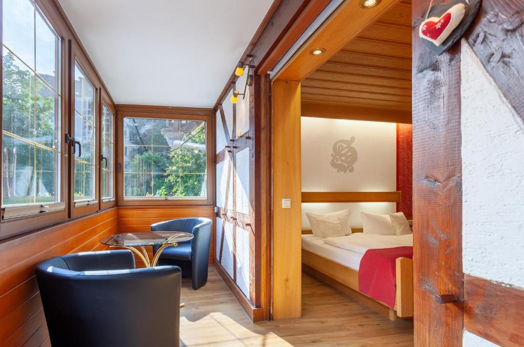 Postel nebo postele na pokoji v ubytování Hotel Sauerländer Hof