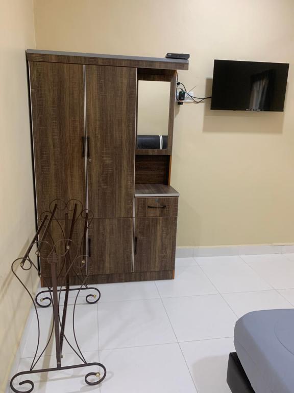 TV a/nebo společenská místnost v ubytování Maze Roomstay Langkawi