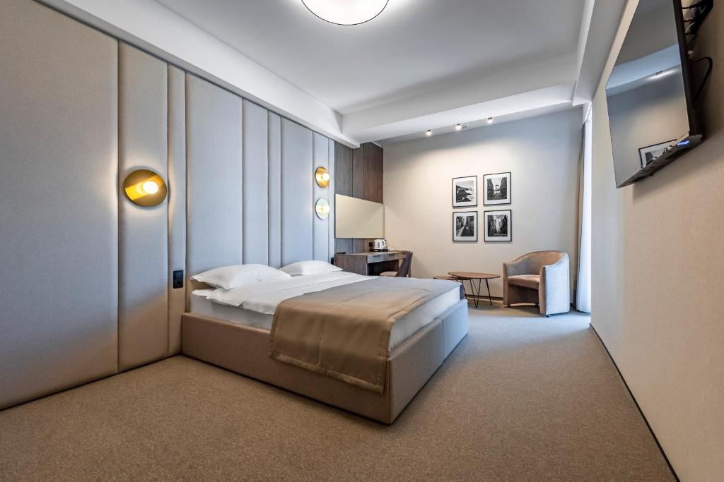 Кровать или кровати в номере Regency Hotel