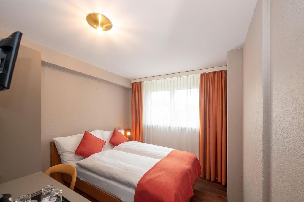 Voodi või voodid majutusasutuse Hotel Alex Business & SPA toas
