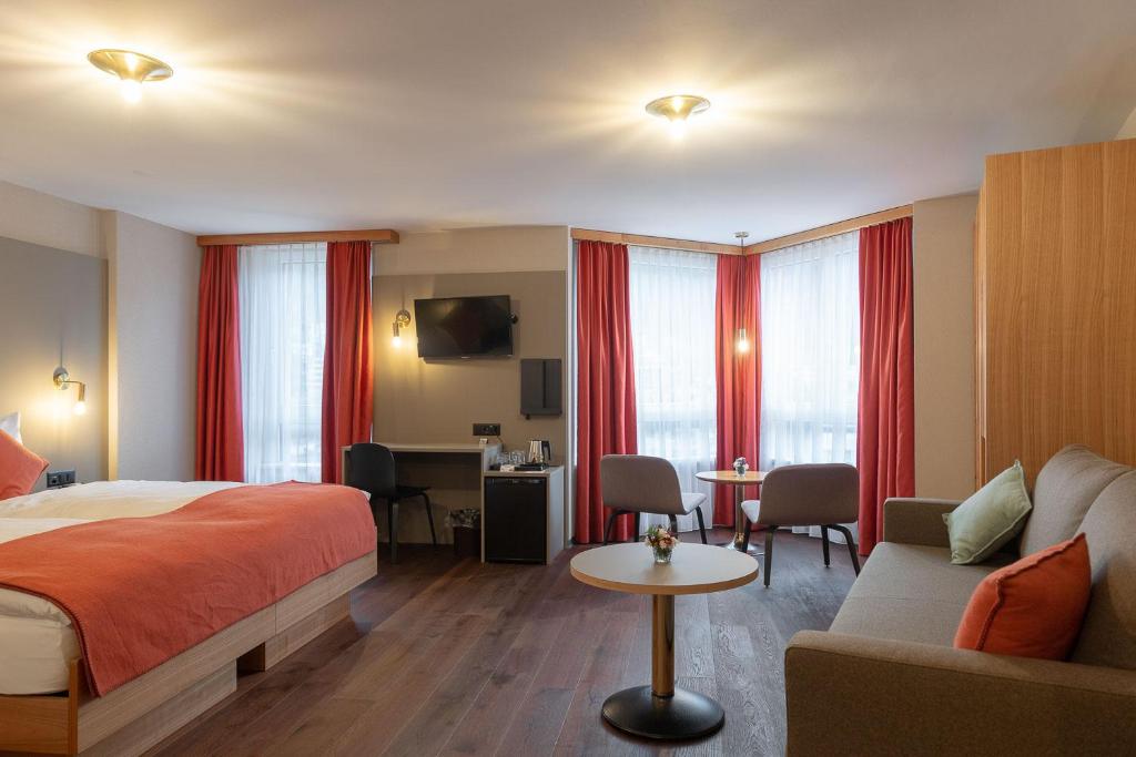 Voodi või voodid majutusasutuse Hotel Alex Business & SPA toas