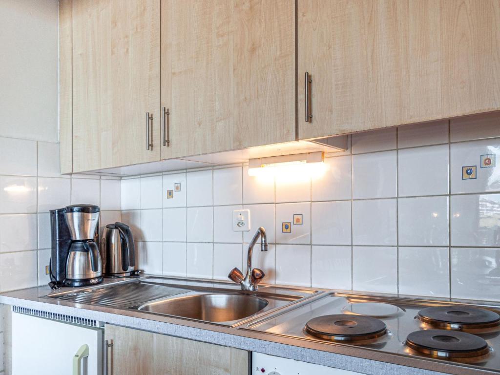 Kuchyň nebo kuchyňský kout v ubytování Apartment Christiania 1 P3 by Interhome
