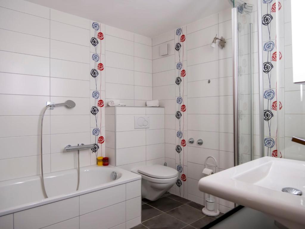 Koupelna v ubytování Apartment Les Girolles A59 by Interhome