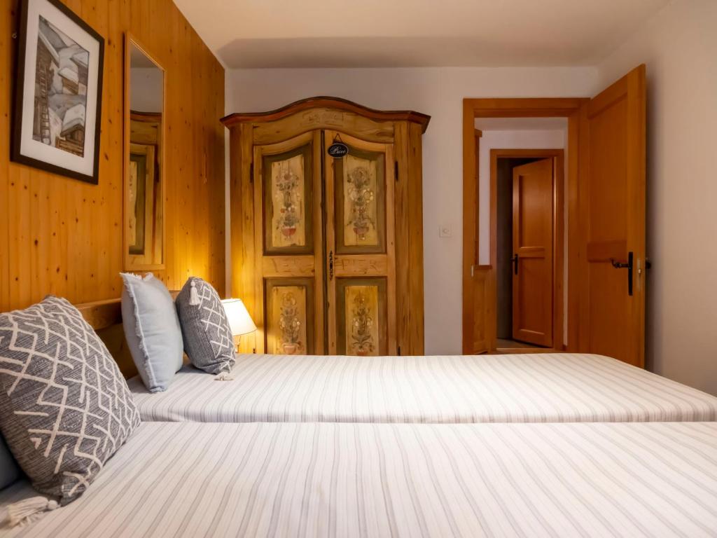 Postel nebo postele na pokoji v ubytování Apartment Baudrier A04 by Interhome