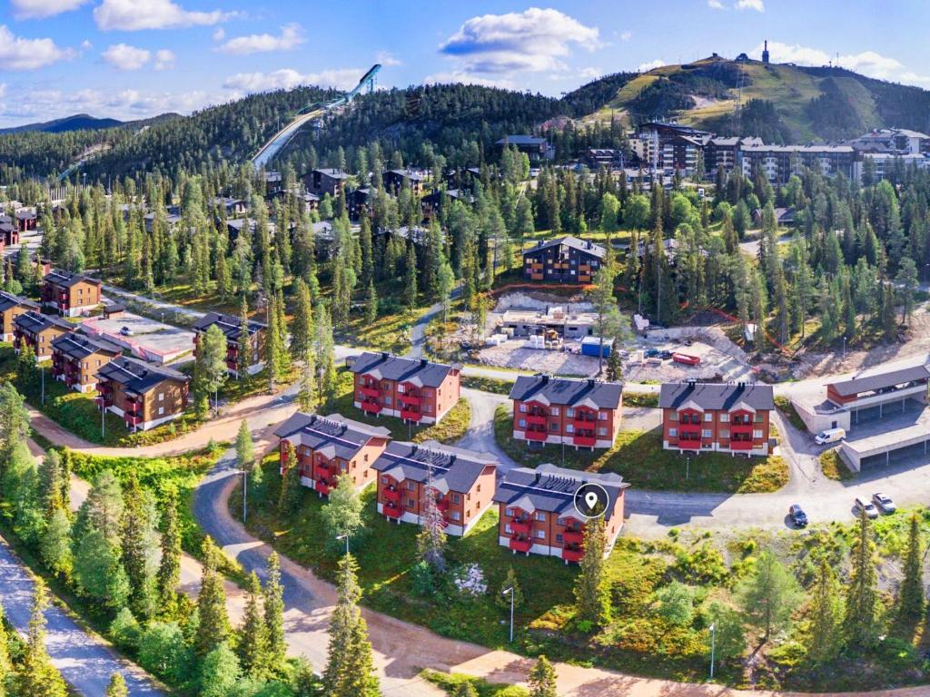 an aerial view of a resort in the mountains at Holiday Home Aurinkoranta by Interhome in Ruka