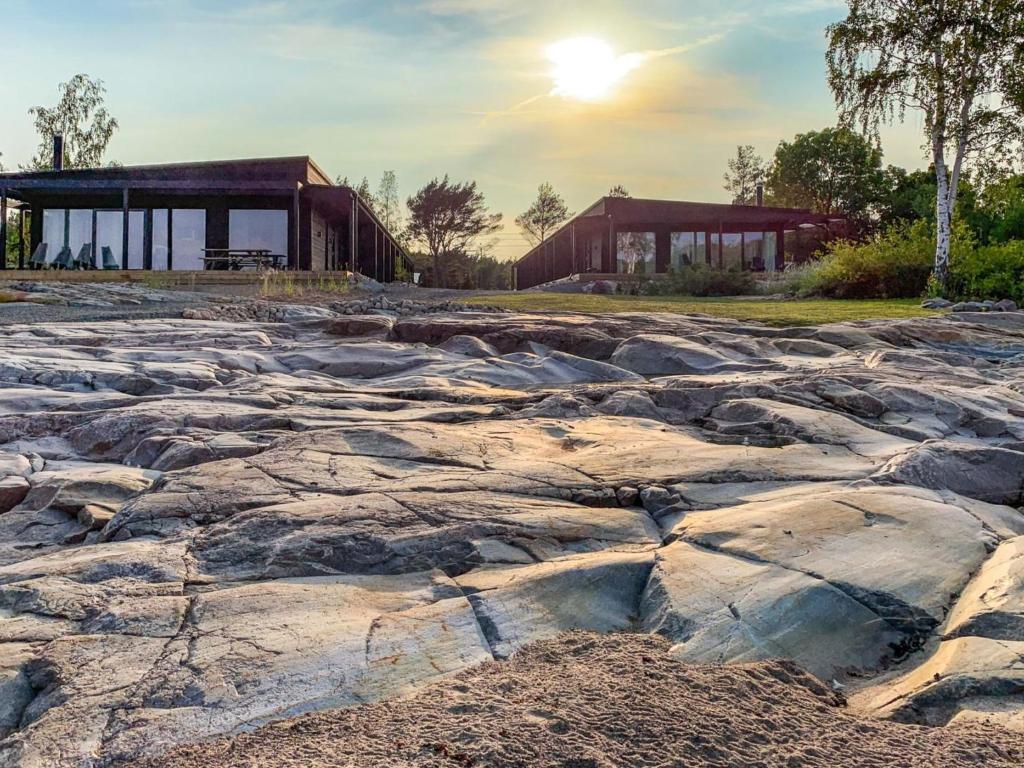 an image of a large rock formation in front of a building at Holiday Home Kasnäs marina a 6 by Interhome in Salo