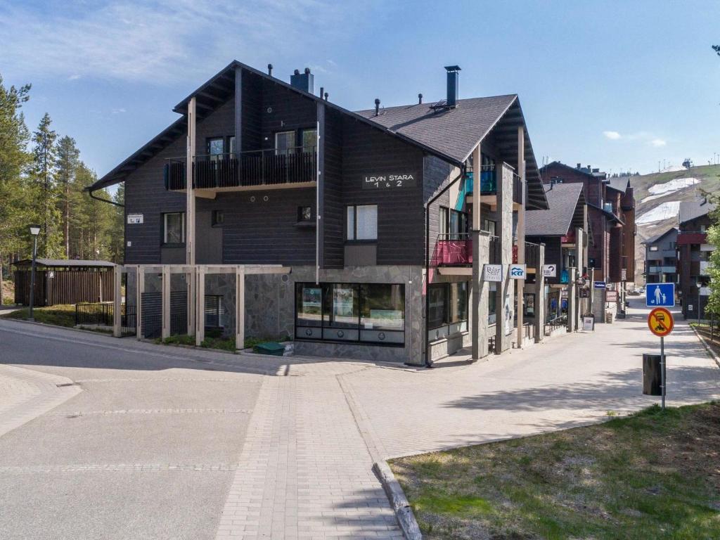 a large building on the side of a street at Holiday Home Levin stara a03 by Interhome in Levi