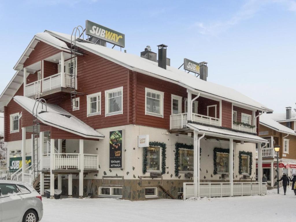 a building with a snowboard on top of it at Holiday Home Keskuskuja b4 by Interhome in Sirkka