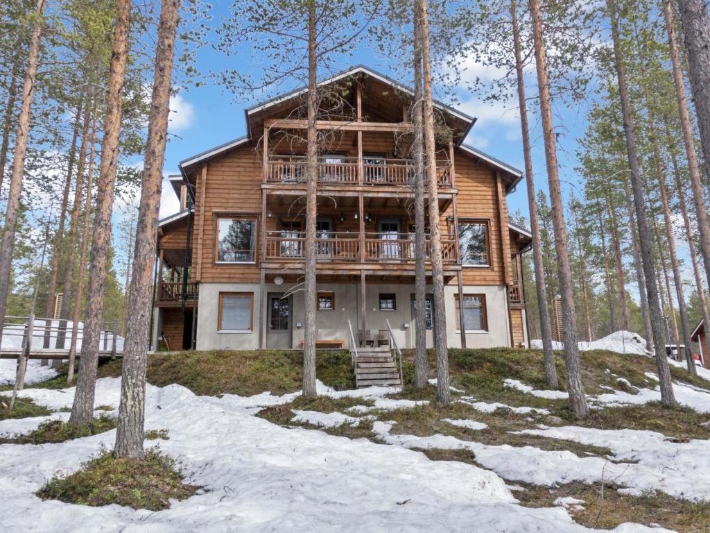 a log home in the woods in the snow at Holiday Home Nuovo casa b by Interhome in Sirkka