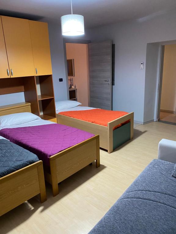 Postel nebo postele na pokoji v ubytování Silver Up appartament